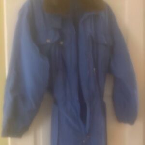 One Piece ski suit by Belfe. It has a brown fur collar.